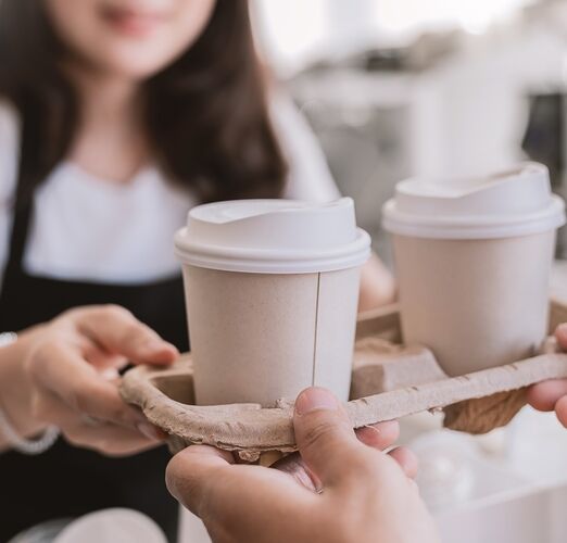Close,Up,Woman,Hands,Gives,Paper,Coffee,Cup,On,Slide