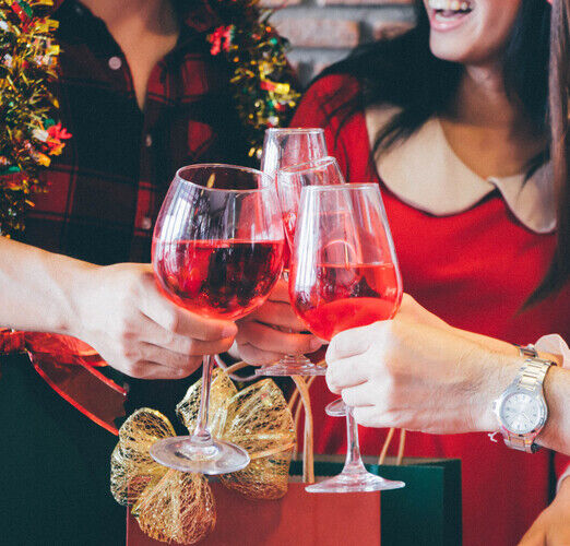 Christmas,Party,Cheerful,Young,Friends,With,Champagne