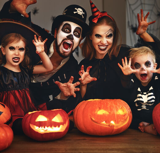 Happy,Family,Mother,Father,And,Children,In,Costumes,And,Makeup