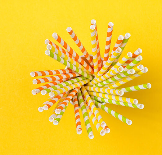 In,A,Paper,Cup,Are,Colored,Cocktail,Tubes,On,The